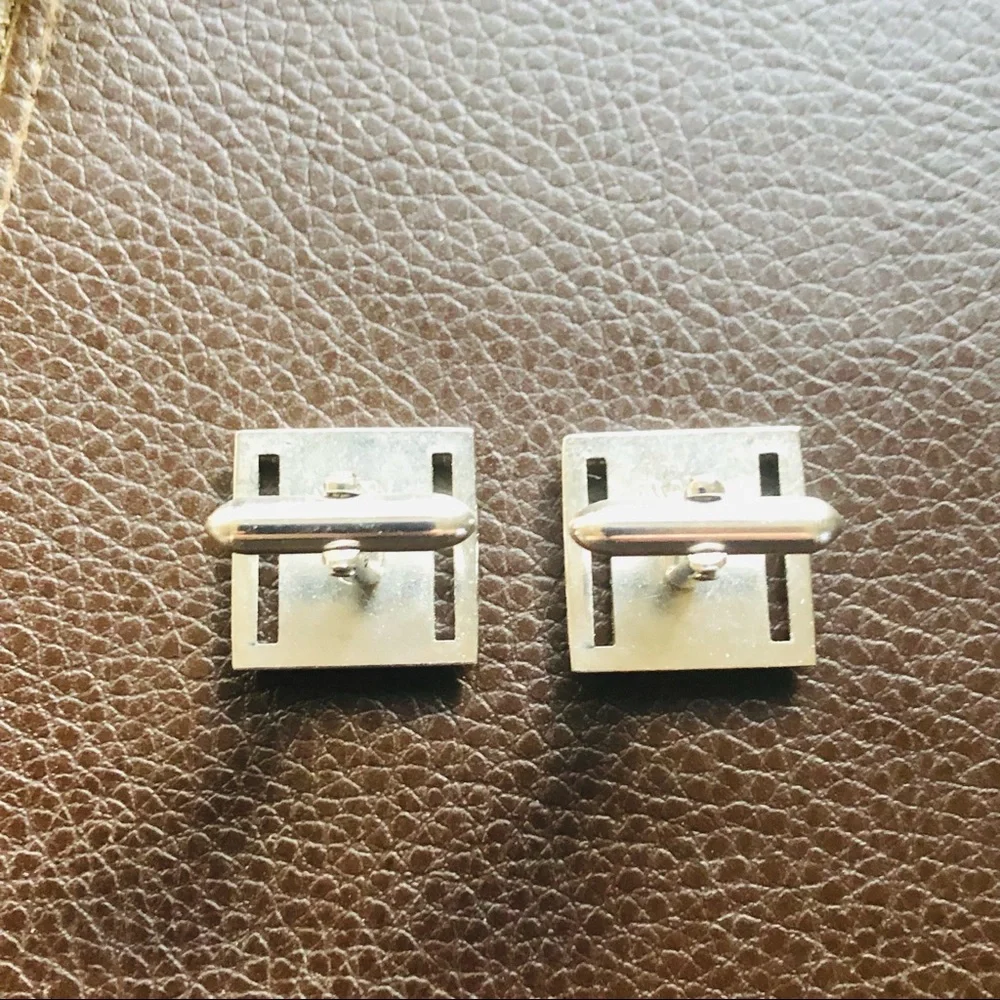 Vintage men’s Swank silver plated square cuff links